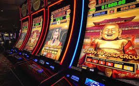 Fa Cai Shen Deluxe slot interface on menang123 online showing prosperity-themed symbols and grid layout